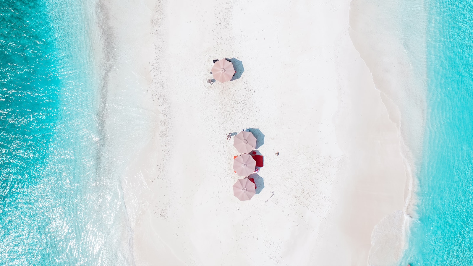 Aerial photograph of umbrellas on a Maldivian sandbar